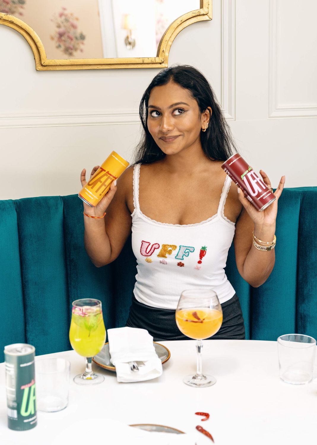 Cans in hand at the table