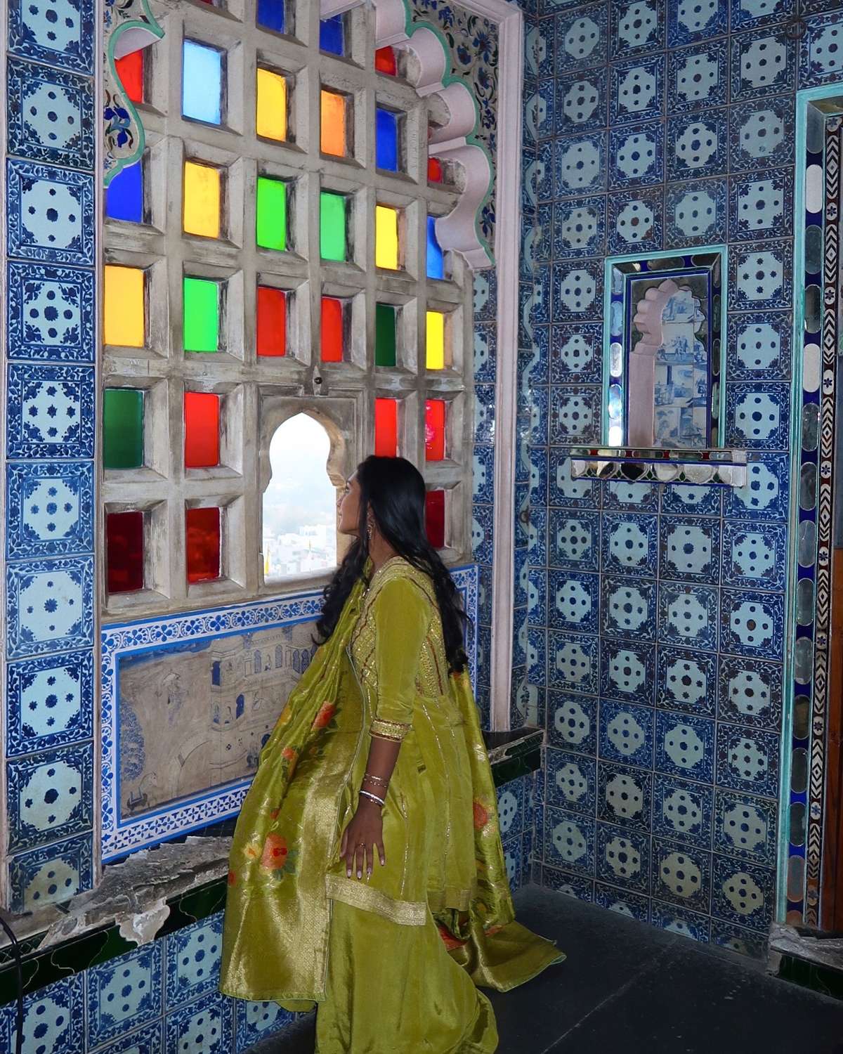 By a stained-glass window in Udaipur